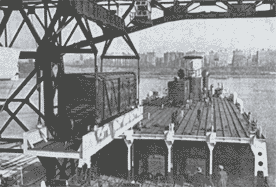 Postwar view of railroad cars being loaded onto SS Seatrain Texas
