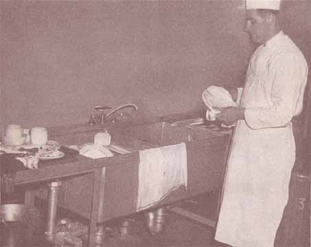 washing dishes aboard ship