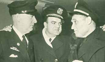 Walter Morrison, Chief Engineer, SS Stella Lykes; R. M. Peterson (affiliation unknown) Captain S. Charles Wallace